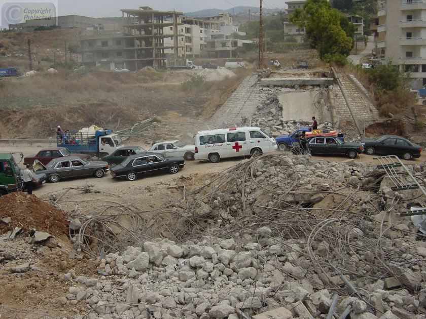 Traffic Passing Downed Bridge